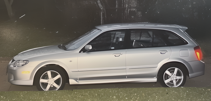 The silver Mazda Protegé hatchback Denmark Lawn started with in 2009.